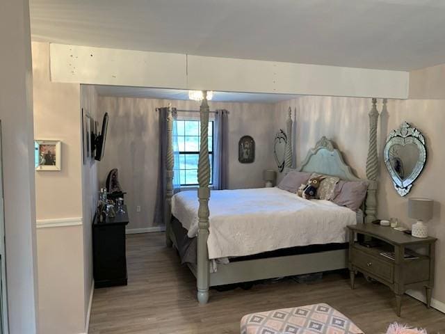 bedroom featuring hardwood / wood-style flooring