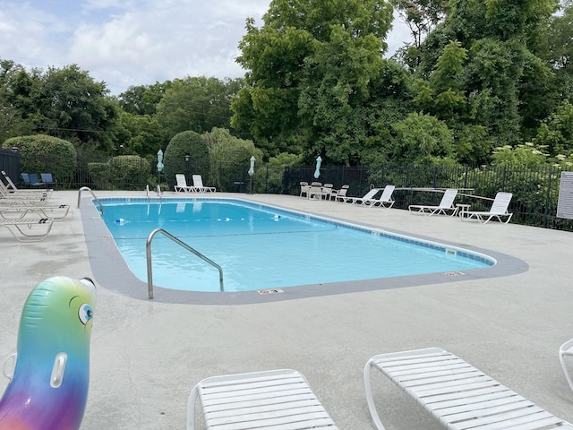 view of swimming pool featuring a patio