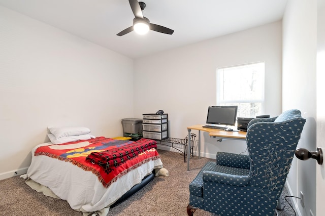 bedroom with ceiling fan and carpet floors