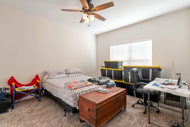 bedroom featuring ceiling fan and carpet flooring