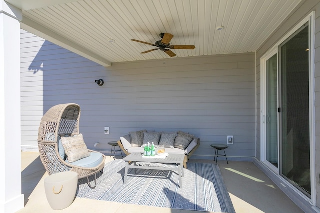 view of patio / terrace featuring ceiling fan and an outdoor living space