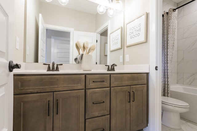 full bathroom with vanity, toilet, and shower / bath combo with shower curtain