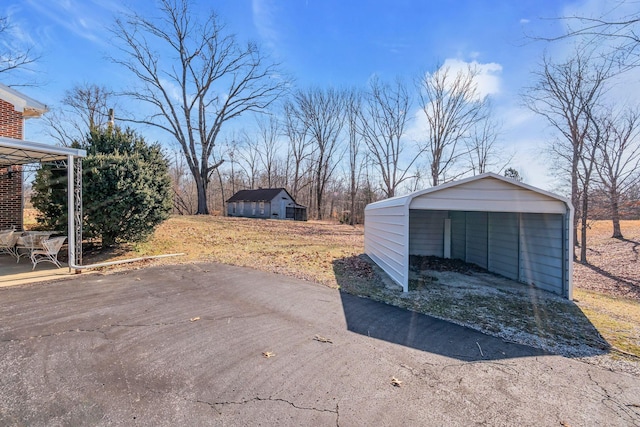 garage with a carport