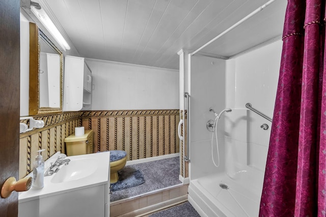 bathroom featuring vanity, toilet, and a shower with curtain