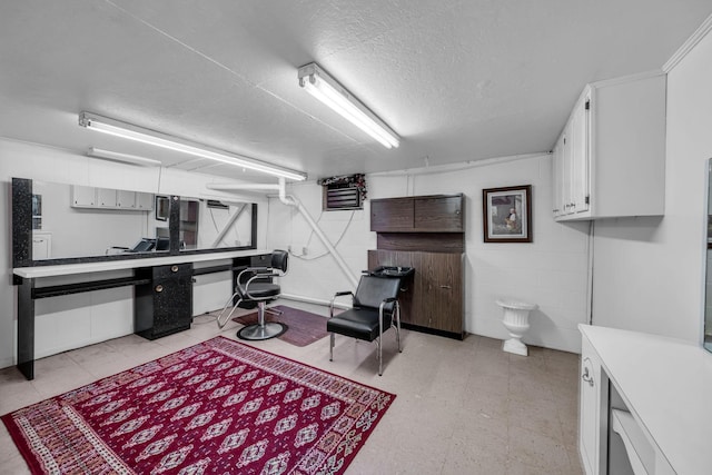 interior space featuring a textured ceiling