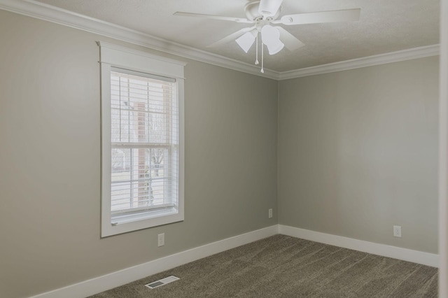 carpeted empty room with crown molding, a textured ceiling, and ceiling fan