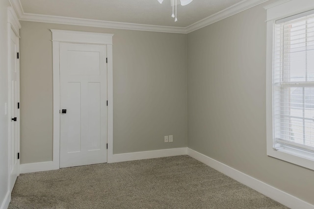 unfurnished bedroom with carpet floors and ornamental molding