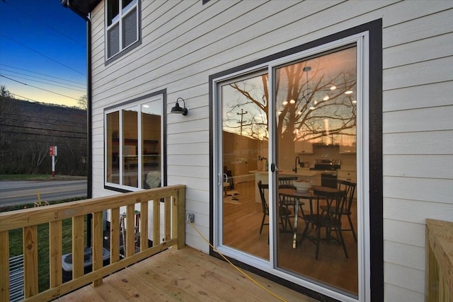 view of deck at dusk