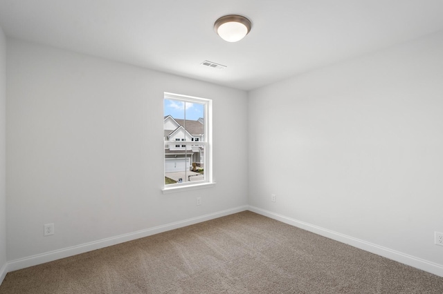 view of carpeted spare room