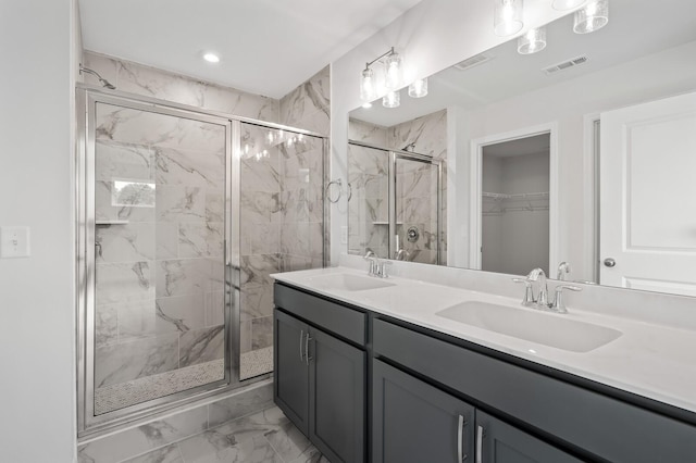 bathroom with vanity and walk in shower