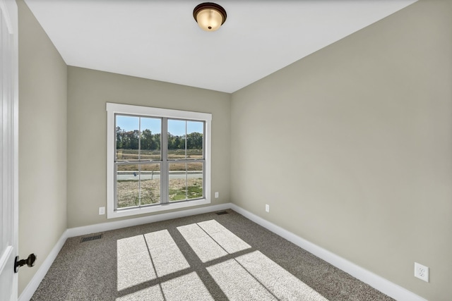 view of carpeted spare room