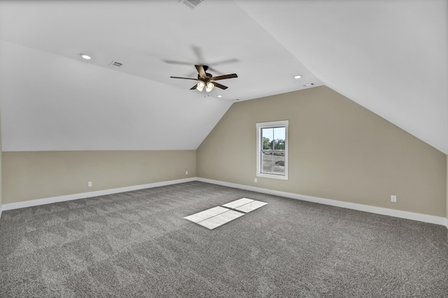 additional living space with lofted ceiling, carpet flooring, and ceiling fan