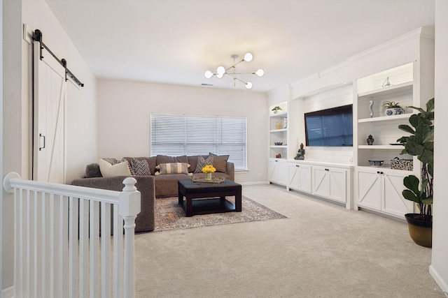 carpeted living room featuring a barn door and built in shelves