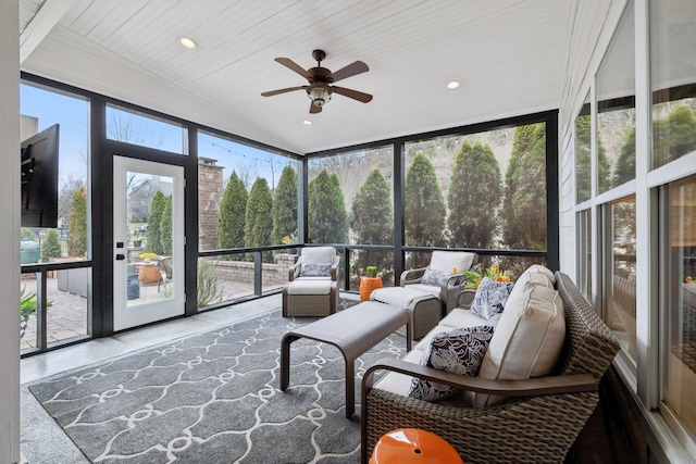 sunroom / solarium with vaulted ceiling and ceiling fan