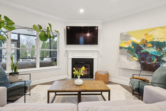 living room featuring hardwood / wood-style floors and ornamental molding