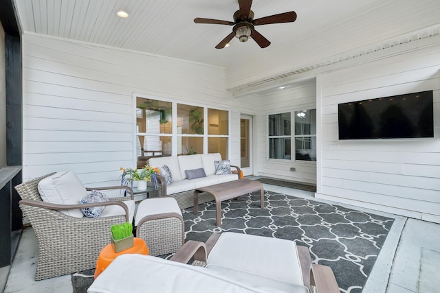 view of patio featuring an outdoor hangout area and ceiling fan