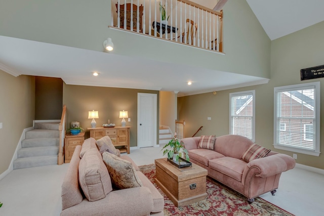 carpeted living room featuring ornamental molding and a towering ceiling