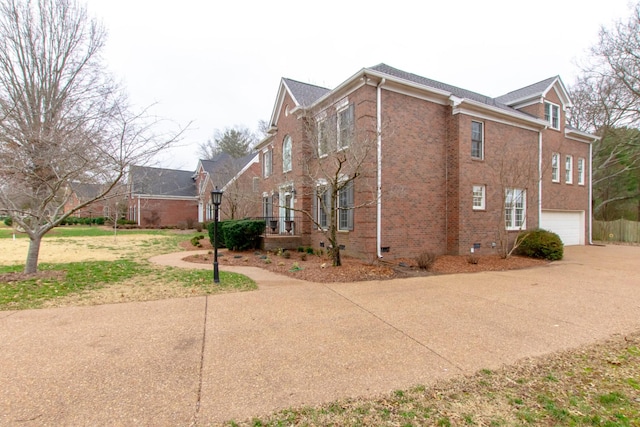 view of property exterior with a garage