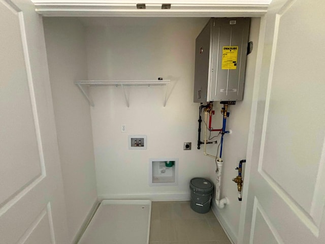 laundry room with tile patterned flooring, washer hookup, hookup for an electric dryer, and tankless water heater