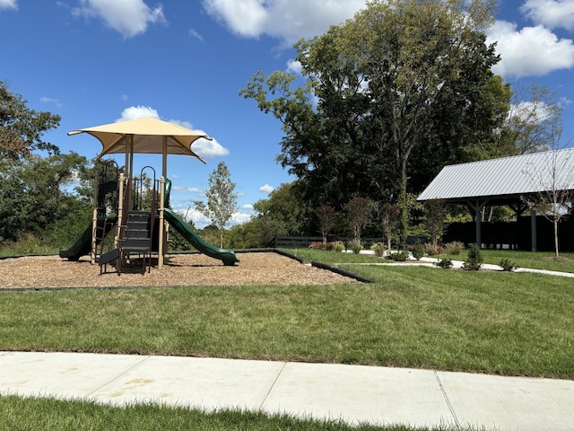 view of jungle gym with a lawn