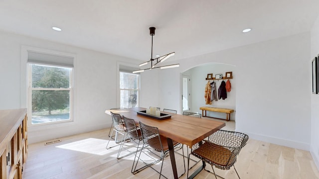 dining area with light wood-type flooring