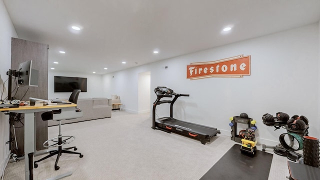 workout room featuring carpet