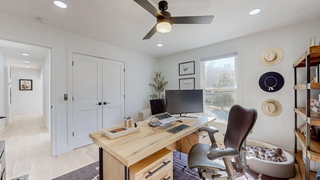 office featuring ceiling fan and light wood-type flooring