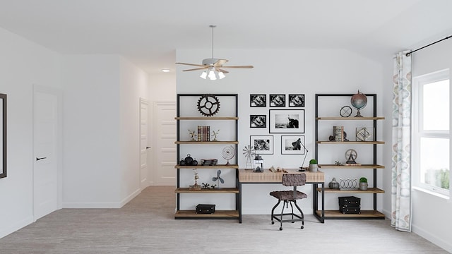 home office featuring vaulted ceiling, plenty of natural light, and ceiling fan