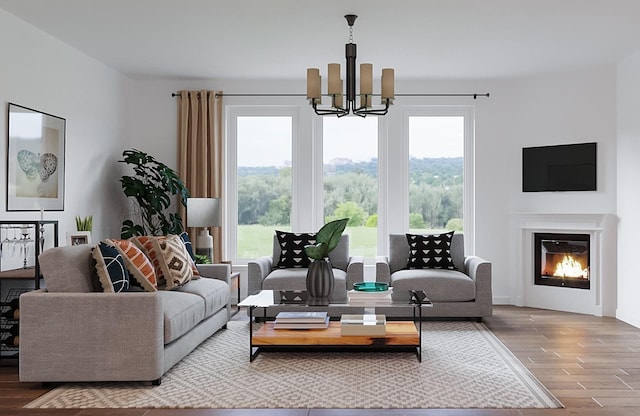 living room featuring hardwood / wood-style floors and an inviting chandelier