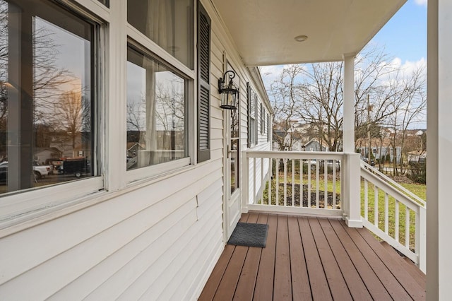 wooden terrace featuring a porch