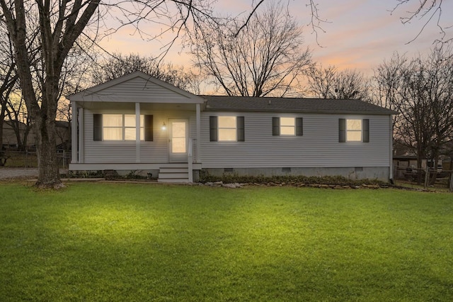 view of front of home featuring a yard