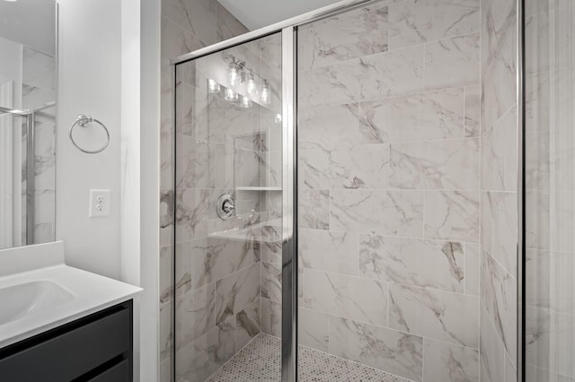 bathroom with vanity and an enclosed shower