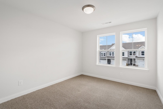 view of carpeted spare room