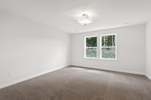 spare room with carpet flooring