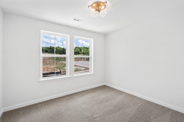 view of carpeted spare room