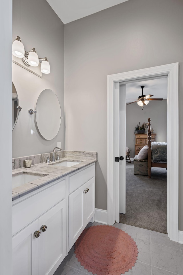 bathroom featuring vanity and ceiling fan