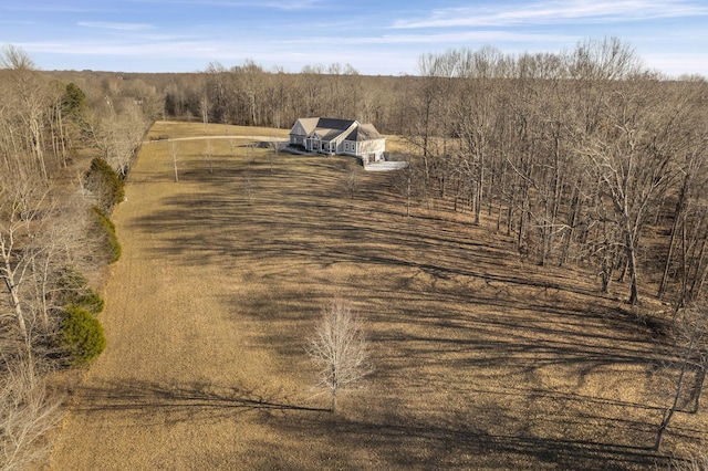 birds eye view of property with a rural view