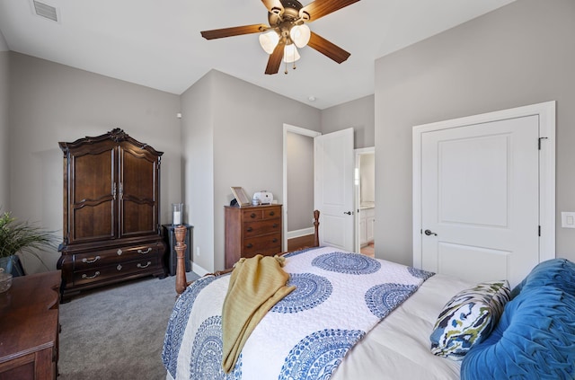 bedroom featuring ceiling fan and carpet