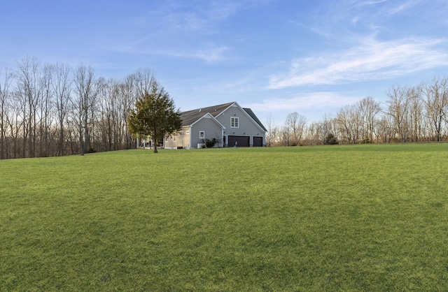 view of yard with a garage