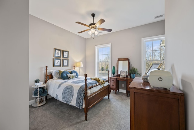 carpeted bedroom with ceiling fan