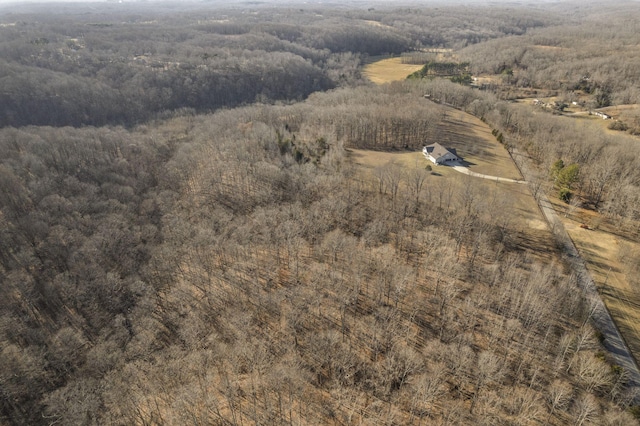 birds eye view of property with a rural view