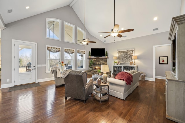 living room with a fireplace, high vaulted ceiling, dark hardwood / wood-style floors, and ceiling fan