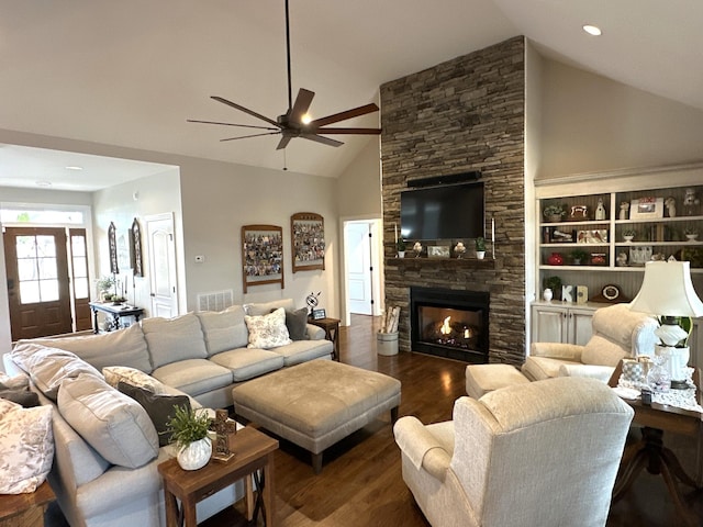 living room with a fireplace, high vaulted ceiling, dark hardwood / wood-style floors, and ceiling fan