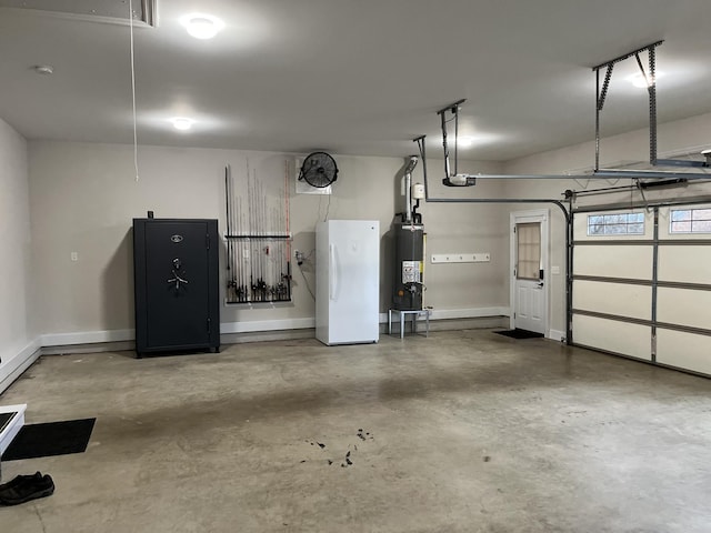 garage featuring white refrigerator and water heater