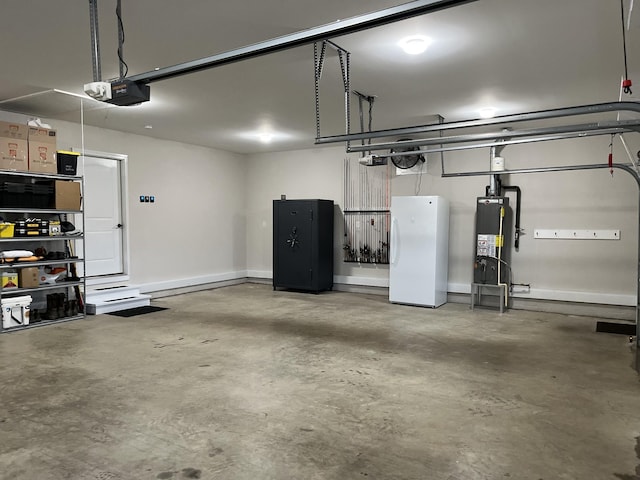 garage with white refrigerator, gas water heater, and a garage door opener