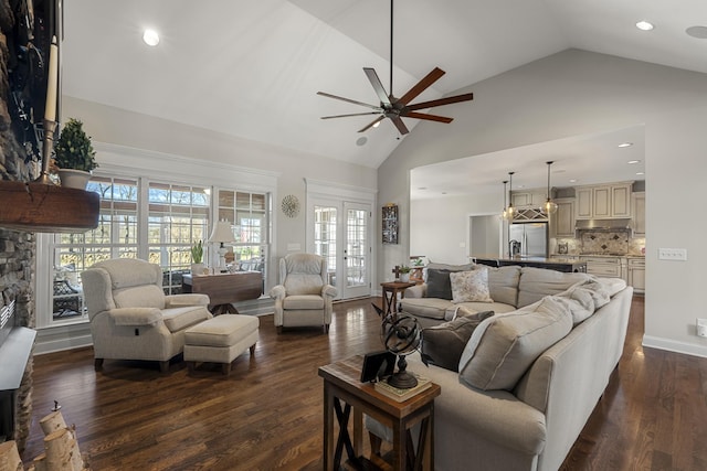 living room with baseboards, a ceiling fan, dark wood-style flooring, high vaulted ceiling, and recessed lighting