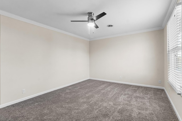 spare room with ornamental molding, ceiling fan, and carpet