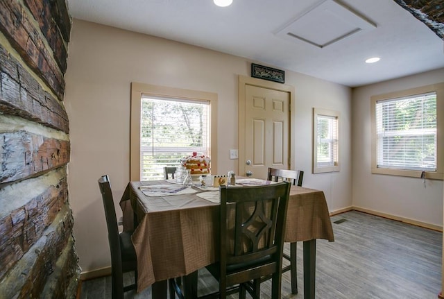 dining area featuring hardwood / wood-style floors