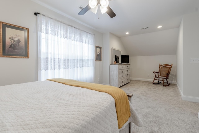 carpeted bedroom featuring vaulted ceiling and ceiling fan