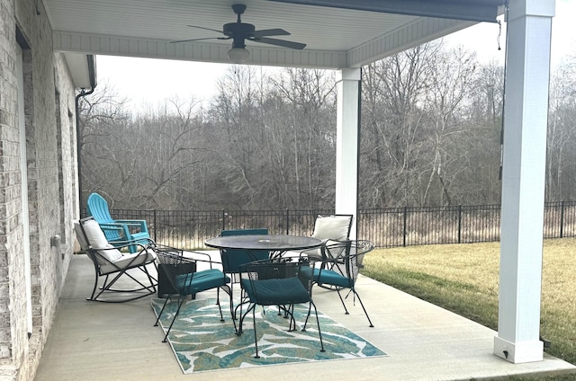 view of patio featuring ceiling fan